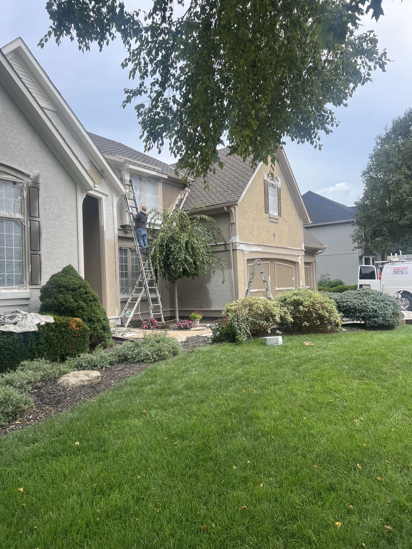 Ruiz Painting crew on a real Kansas City metro job